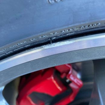 Discount Tire - nice chunk taken out of the very edge.  Not curb rash. Its a tooling mark - Tires Near Me - Johnsburg, Illinois