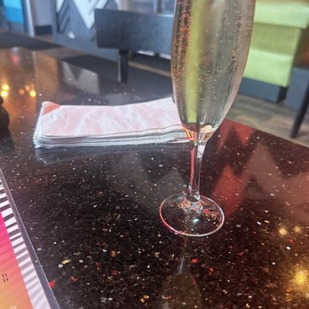 Lost & Found - White peach mimosa - Cocktail Bars Near Me - Houston, Texas