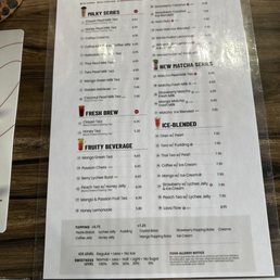 Menu taped to the table in front of order window