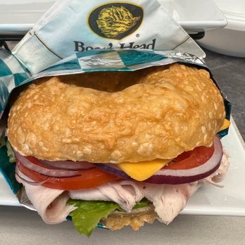 Lala’s Bagels - Ovengold turkey lettuce, tomato, red onion, cheddar cheese topped with honey mustard. All on a Asiago bagel! - Bakeries Near Me - DeKalb, Illinois