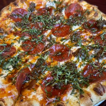 Back Draughts Pizza - Red sauce, pepperoni, bacon, meatball and basil. - Pizza Near Me - New Port Richey, Florida Back Draughts Pizza - Red sauce, pepperoni, bacon, meatball and basil. - Pizza Near Me - New Port Richey, Florida