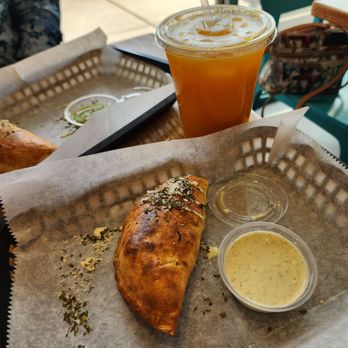 The Empanada Cookhouse - Spinach and mushroom with side of dipping sauce. - Empanadas Near Me - Dallas, Texas The Empanada Cookhouse - Spinach and mushroom with side of dipping sauce. - Empanadas Near Me - Dallas, Texas