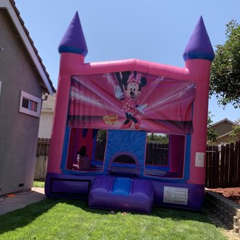 Kids Bouncing Fun - Regular sized bounce house castle w/ Minnie Mouse banner add-on for $20. - Bounce House Rentals Near Me Kids Bouncing Fun - Regular sized bounce house castle w/ Minnie Mouse banner add-on for $20. - Bounce House Rentals Near Me