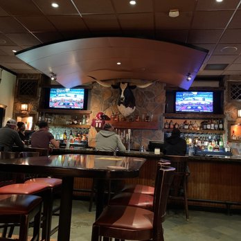 LongHorn Steakhouse - Bar and partial of bar seating area - Steakhouses Near Me - Pooler, Georgia