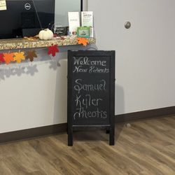 HJ Dental - Sign that welcomes new patients at entrance.