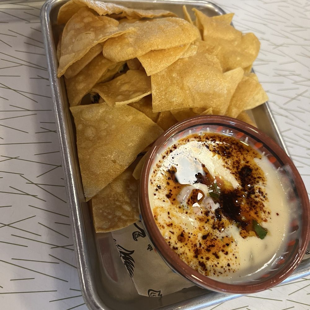 Strange Bird - Chips & queso dip - Venues & Event Spaces Near Me - Savannah, Georgia Strange Bird - Chips & queso dip - Venues & Event Spaces Near Me - Savannah, Georgia