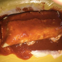 La Huerta - Pork tamale with red & sour cream sauce