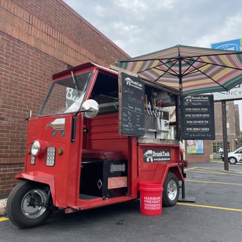 Drank Tank - a red truck parked in a parking lot - Beverage Store Near Me Drank Tank - a red truck parked in a parking lot - Beverage Store Near Me
