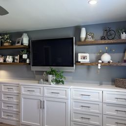 Built-in cabinets and floating shelves. Built-in cabinets and floating shelves.