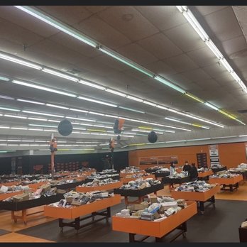 EL Remate - Inside store, tables full of boxes and smaller items. - Discount Store Near Me - El Paso, Texas