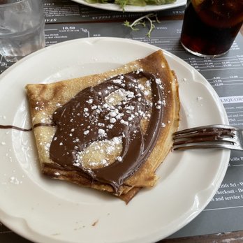 La Flotille - Their Nutella Crepe, already started. It doesn't look pretty but it was delicious. - French Near Me - Versailles, 78 La Flotille - Their Nutella Crepe, already started. It doesn't look pretty but it was delicious. - French Near Me - Versailles, 78