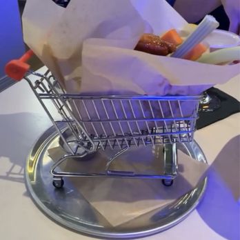 Holey Moley - Who can say no to wings in a mini shopping cart?! - Mini Golf Near Me - San Francisco, California Holey Moley - Who can say no to wings in a mini shopping cart?! - Mini Golf Near Me - San Francisco, California