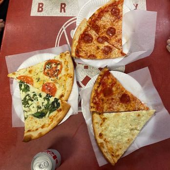 Bronx Pizza - 6 slices -- counterclockwise: two pepperoni, one margarita & one ricotta and spinach, one pepperoni & formaggio - Pizza Near Me - San Diego, California