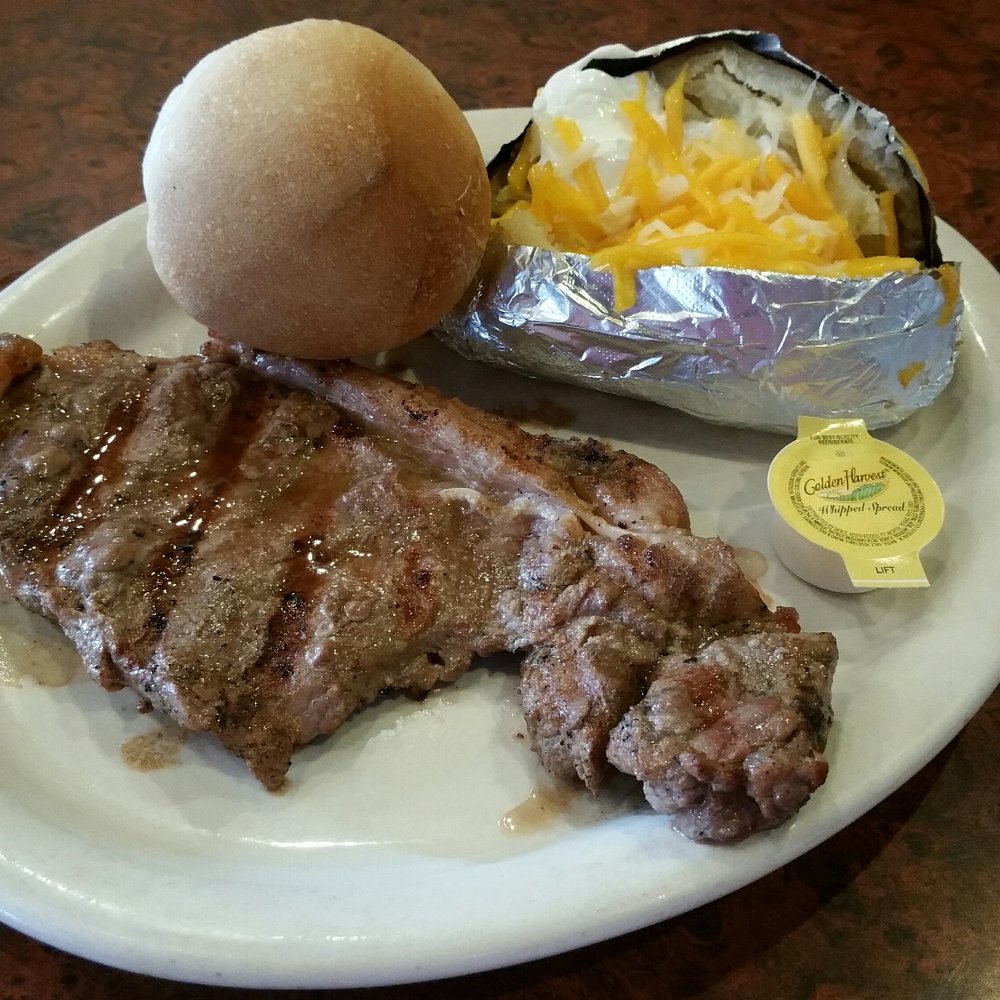 Landmark Grill - 8 ounce sirloin with baked potato. - American Near Me - Lewisville, Texas Landmark Grill - 8 ounce sirloin with baked potato. - American Near Me - Lewisville, Texas
