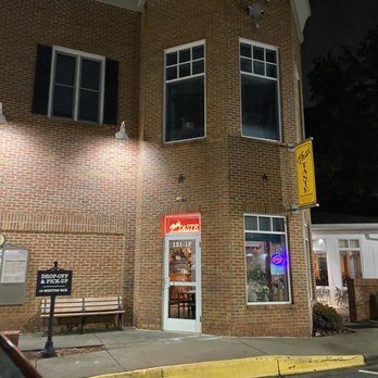 Thai Taste - Matthews - the outside of a restaurant at night - Thai Near Me - Matthews, North Carolina Thai Taste - Matthews - the outside of a restaurant at night - Thai Near Me - Matthews, North Carolina
