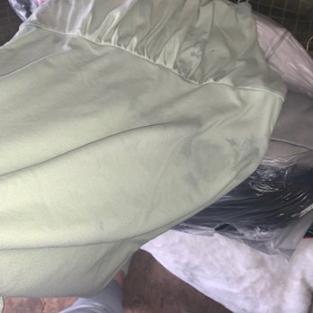 Wash N Go Laundry - Brand new shirt that is ruined by stain, was folded small and hidden in a stack of clothes. - Laundromat Near Me - National City, California Wash N Go Laundry - Brand new shirt that is ruined by stain, was folded small and hidden in a stack of clothes. - Laundromat Near Me - National City, California