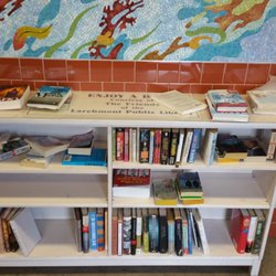 Larchmont Train Station - Lending Library next to the Ticket Booth!