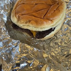 Big Deal Burger - Single with cheese, onion, pickles, jalapeño , heartache, sadness