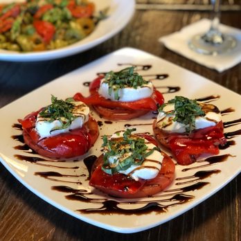 Red White & Brew - a plate of tomatoes with mozzarella - American Near Me - Mesa, Arizona Red White & Brew - a plate of tomatoes with mozzarella - American Near Me - Mesa, Arizona