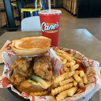 Raising Cane's Chicken Fingers - Open Faced Chicken Fingers Combo with Canes Signature Sauce and Lemonade. - Fast Food Near Me - Escondido, California Raising Cane's Chicken Fingers - Open Faced Chicken Fingers Combo with Canes Signature Sauce and Lemonade. - Fast Food Near Me - Escondido, California