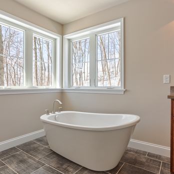 S Gerald Musser Builder - a bathtub in a bathroom - General Contractors Near Me - Palmyra, Pennsylvania