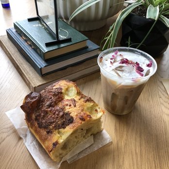 Trellis Coffee Bar - 1902 iced latte with focaccia of the day (tomato, basil, mozzarella) - Coffee & Tea Near Me - Augusta, Georgia