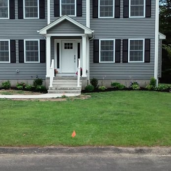 Matos Lawn Care - the front of a house - Landscape Architects or Designers Near Me