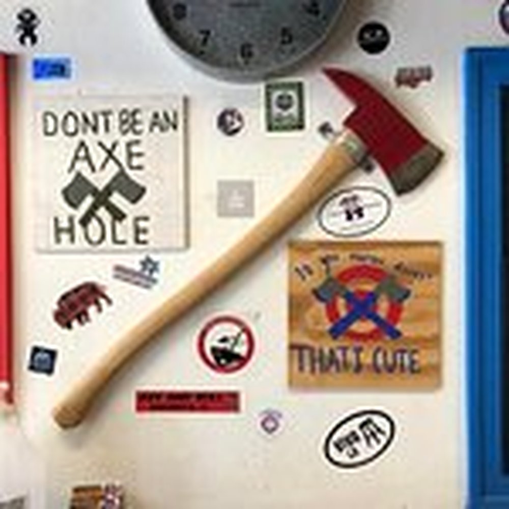 Axe and Bull - A wall in the lobby. - Axe Throwing Near Me - Sarasota, Florida Axe and Bull - A wall in the lobby. - Axe Throwing Near Me - Sarasota, Florida