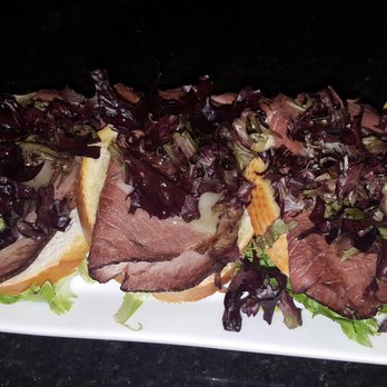 Madrid Tapas Restaurant & Wine Bar - Lavender beef crustini. - Tapas Bars Near Me - Green Bay, Wisconsin