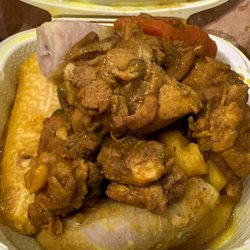 Golden Krust Caribbean Restaurant - Curry chicken with dumpling plantain and banana