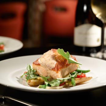 Brickton - two plates of food and a glass of wine - New American Near Me - Chicago, Illinois