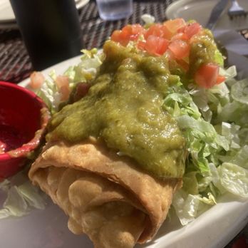 Wisdom's Cafe - Chimichanga made vegan with lard free tortilla, vegetable fajitas, refried beans, whole beans, and guacamole. green sauce on the side - Mexican Near Me - Tumacacori, Arizona Wisdom's Cafe - Chimichanga made vegan with lard free tortilla, vegetable fajitas, refried beans, whole beans, and guacamole. green sauce on the side - Mexican Near Me - Tumacacori, Arizona