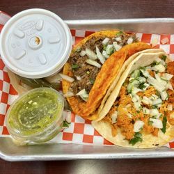 Cielito Lindo Taqueria - Regular chicken taco (bottom) and speciality taco (top)
