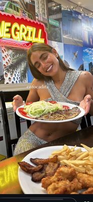 Manolo & Rene Grill by null