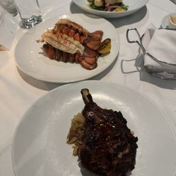 Lobster tails and a pork chop