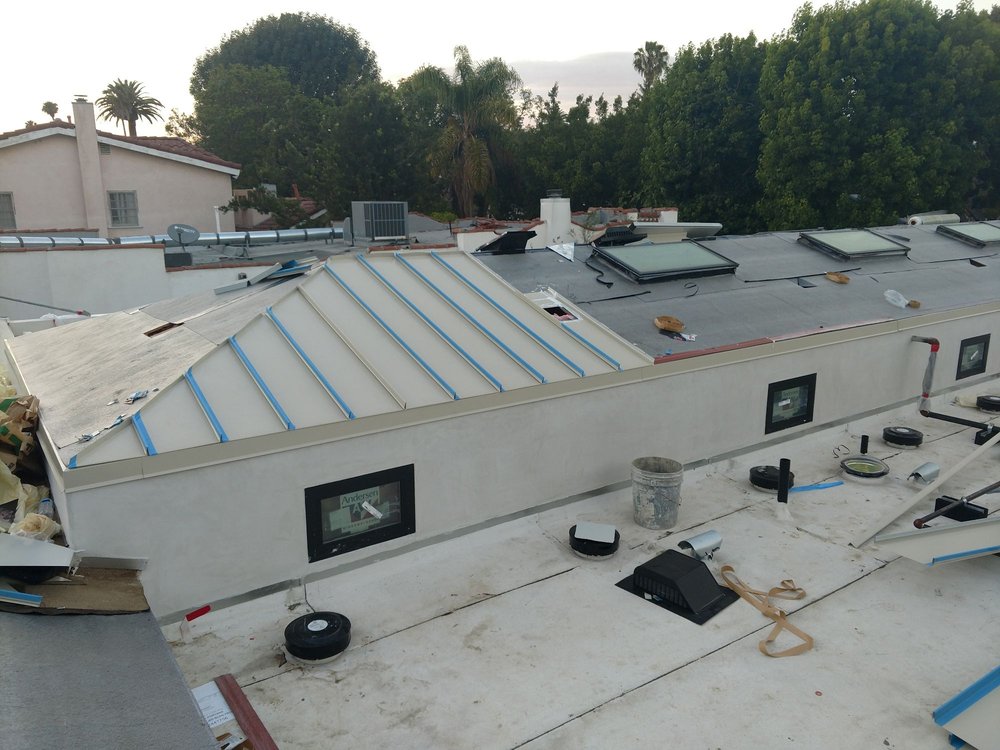 Slide of Golden Winter Roofing