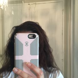 Two weeks later. The damage has turned my naturally straight hair into a frizzy and broken nightmare.
