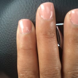 Jagged edges! Thank God its gel manicure bcuz I get 2 stare @ the sloppy job for week or 2! this is after I asked them 2 fix it. Jagged edges! Thank God its gel manicure bcuz I get 2 stare @ the sloppy job for week or 2! this is after I asked them 2 fix it.