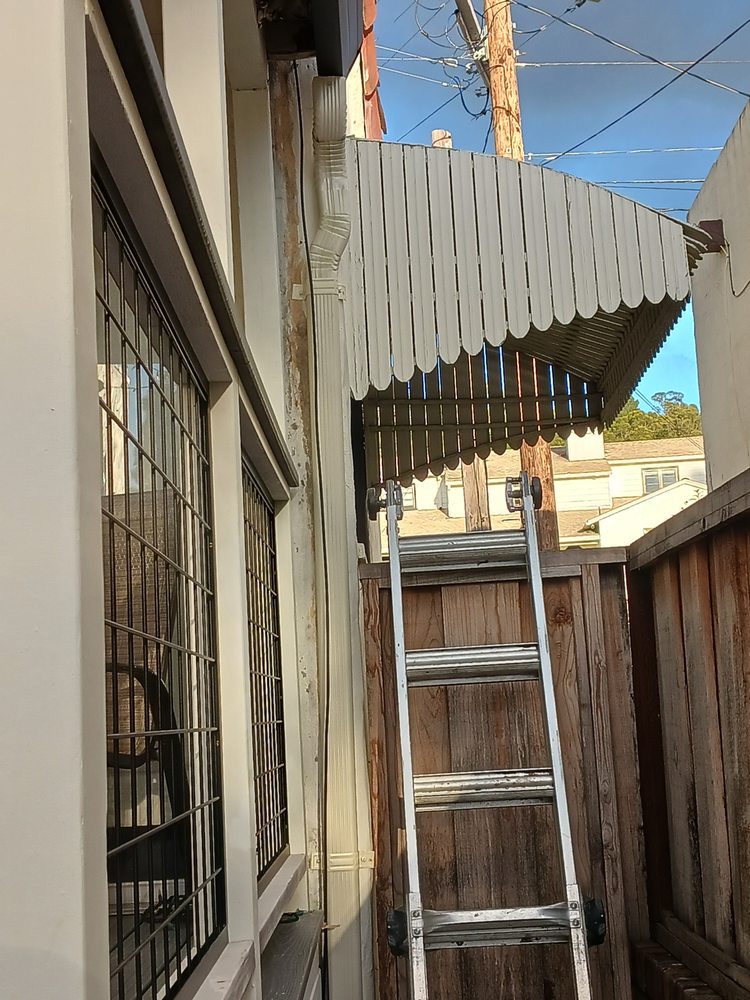 Slide of JB Rain Gutter installation