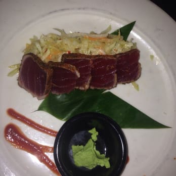 Kona Brewing - Ahi with papaya salad (listed under pupus) it was delicious. Warning the red is sriracha. My friend totally drenched hers in it. - Pubs Near Me - Honolulu, Hawaii Kona Brewing - Ahi with papaya salad (listed under pupus) it was delicious. Warning the red is sriracha. My friend totally drenched hers in it. - Pubs Near Me - Honolulu, Hawaii