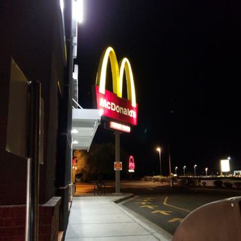 McDonald's - a mcdonald's sign lit up at night - Fast Food Near Me - Tucson, Arizona McDonald's - a mcdonald's sign lit up at night - Fast Food Near Me - Tucson, Arizona