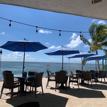 Lazy Days Restaurant - Patio outside dining on the beach- also some in the shade. - Seafood Near Me - Islamorada, Florida Lazy Days Restaurant - Patio outside dining on the beach- also some in the shade. - Seafood Near Me - Islamorada, Florida