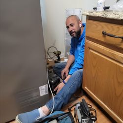 WPK Appliance Service - Josh installing my new compressor.