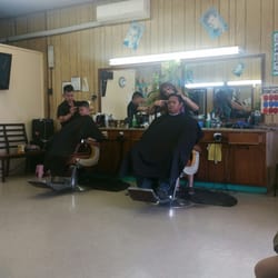 Quality Barber Shop - Husband getting his hair cut!