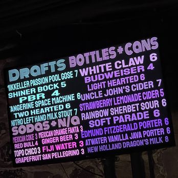 Lo-Fi - a large screen displaying a variety of drinks - Bars Near Me - Ann Arbor, Michigan
