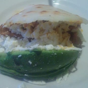 Arepas Cafe - Amazing Mami Arepas- Venezuelan roast pulled pork, avocado, and white shredded cheese - Venezuelan Near Me - Astoria, New York
