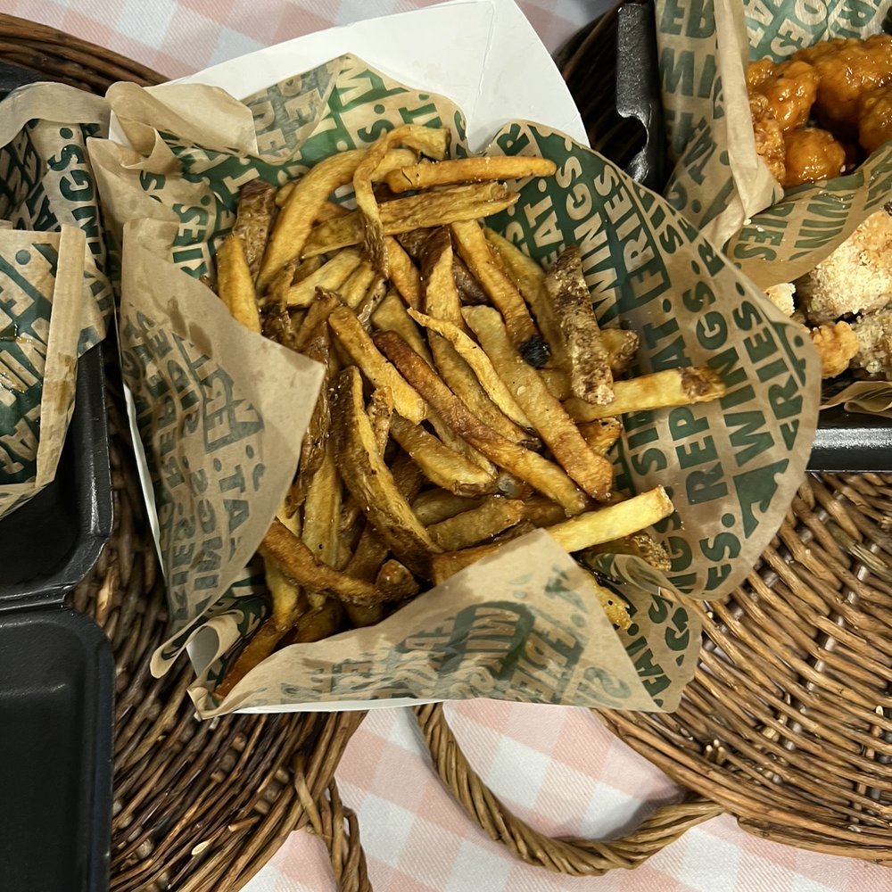 Wingstop - a basket of french fries and a basket of donuts - Chicken Wings Near Me - West Jordan, Utah Wingstop - a basket of french fries and a basket of donuts - Chicken Wings Near Me - West Jordan, Utah