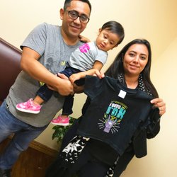 Rodeo Dental & Orthodontics of Pharr - These parents were ready to show off their Rodeo merch after a successful pediatric visit!