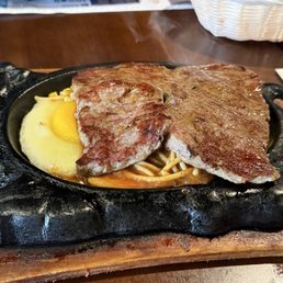 Steak pasta egg and corn with black pepper sauce Steak pasta egg and corn with black pepper sauce