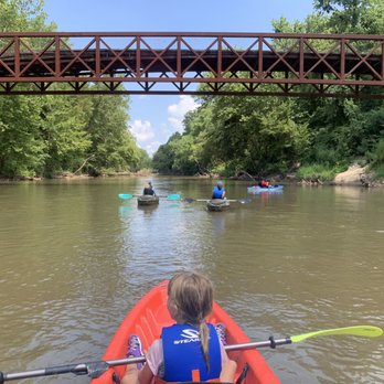 Blues City Kayaks - Going under the bridge - Rafting/Kayaking Near Me